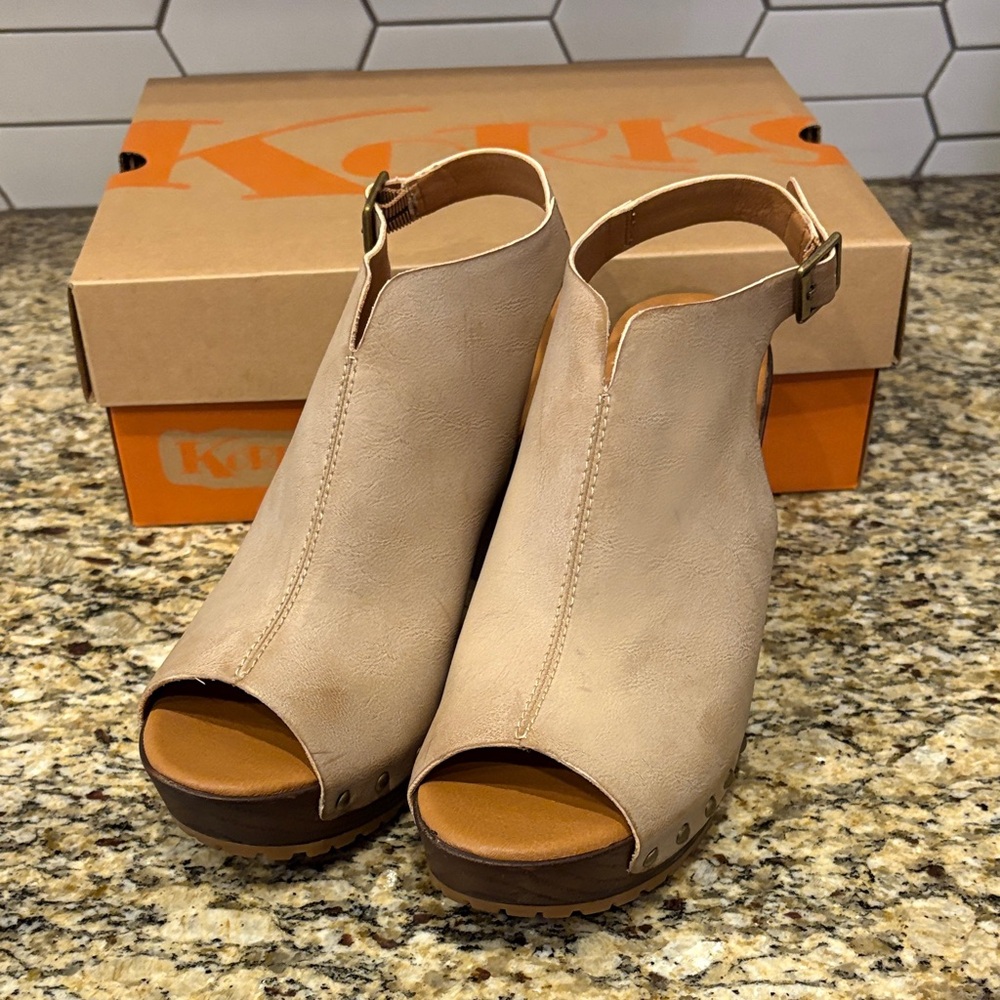 Kork’s Arden Peep-Toe Mules in color natural
